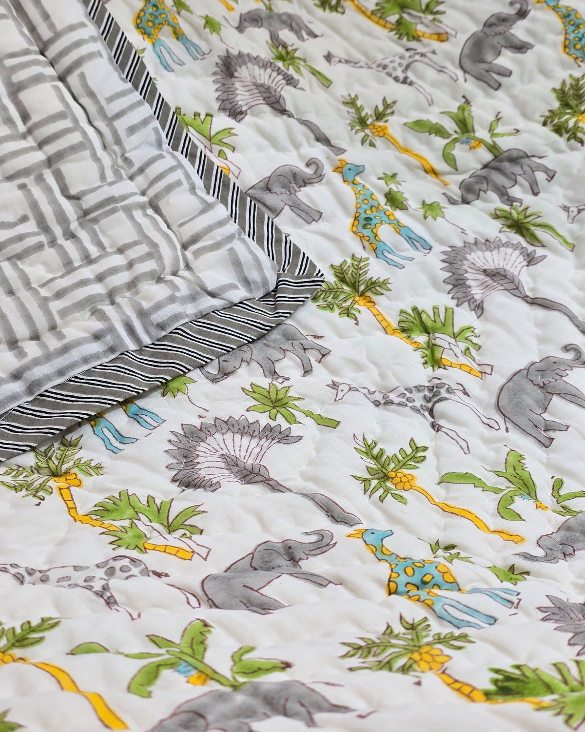 WILDWOOD SAFARI HAND BLOCK BABY REVERSIBLE QUILT