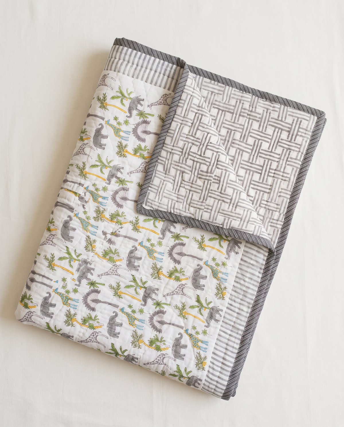 WILDWOOD SAFARI HAND BLOCK BABY REVERSIBLE QUILT