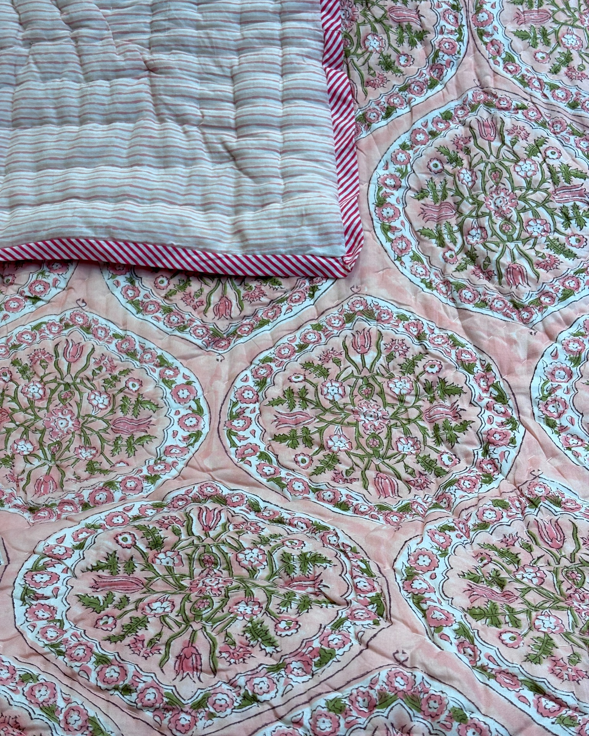 GULZAR PEACH FLORAL HAND BLOCK REVERSIBLE QUILT